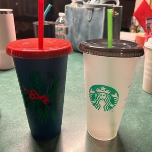 Two plastic Starbucks cold cups